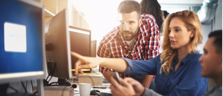 https://www.avepoint.com/blog/wp-content/uploads/2017/09/application-developers-at-work-picture-id626999150.jpg